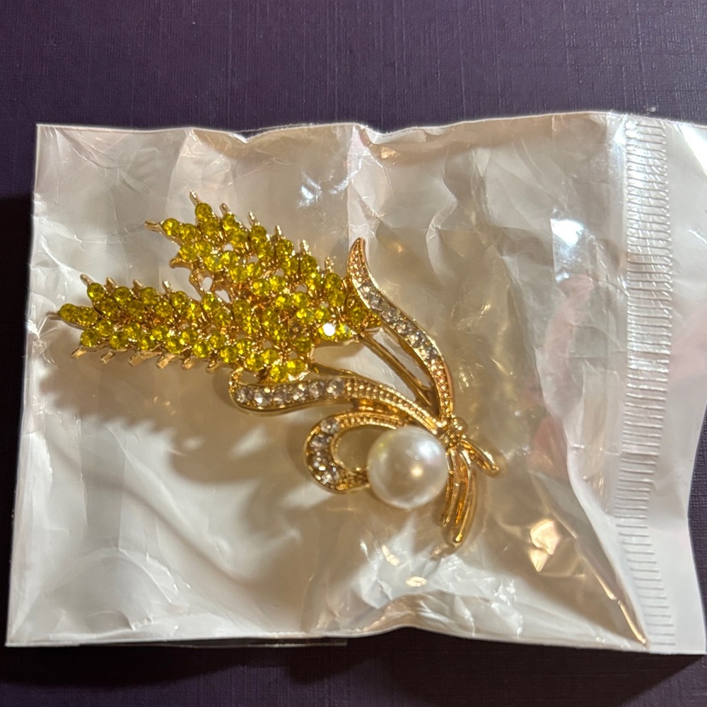 Elegant Gold and Yellow Brooch with Pearl Accent
